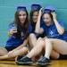 Safety Town high school volunteers Jenny Shapiro, 17, Lexi Flake, 17, and Rachel Ciarkoski, 16, ham it up for a photo while in the gym before graduation at Dicken Elementary School on Friday, July, 26, 2013. Melanie Maxwell | AnnArbor.com